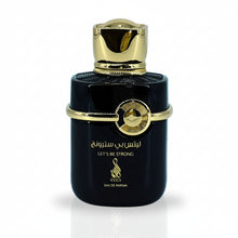 Încarcă imaginea în Galerie, Risala Let's Be Strong este un parfum unisex, care combina note calde si lemnoase cu accente florale si condimentate, creand o experienta olfactiva echilibrata si sofisticata.
