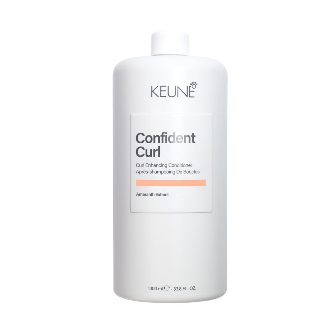 Keune Care Confident Curl Enhancing Conditioner ofera hidratare intensa si definire pentru parul ondulat sau cret.